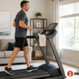 Man walking on treadmill at home for exercise recovery and healthy aging with MOPE Clinic logo